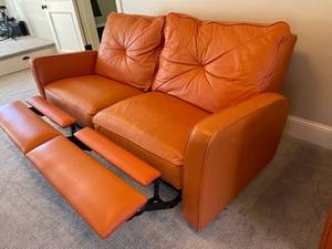 lot 17 image: Orange Leather Reclining Couch