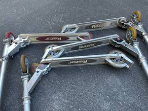 lot 215 image: 4 Folding Razor Scooters