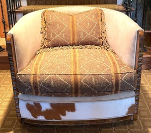 lot 7 image: Paul Robert Swivel Cow Chair