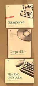 lot 32A image: Vintage Apple Macintosh TV with Remote, Manuals, Keyboard and More