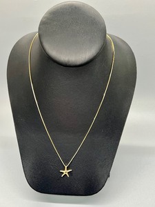 lot 236 image: 14k Gold Starfish Pendant and Chain
