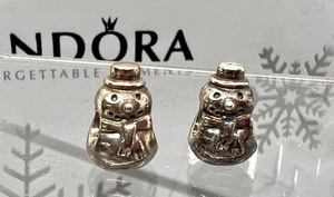 lot 436 image: Two Sterling Pandora Snowman Charms