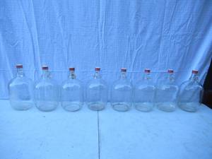 lot 30 image: Vintage Lot of 8 - 1 Gallon Coca Cola Syrup Jugs. 