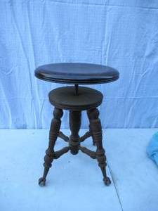 lot 34 image: Beautiful Antique Piano Stool. Glass ball feet. Adjustable.