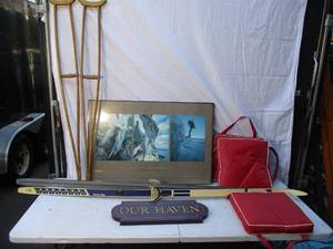 lot 37 image: Miscellaneous Lot Vintage Wall Art, Skis, Crutches, Boat cushions