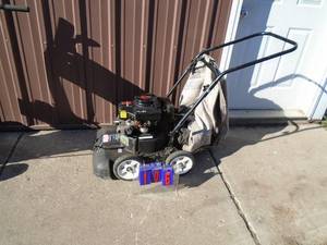 lot 106 image: Vantage by Tecumseh lawn vacuum with bag. Used condition. Tested & works. As shown.
