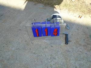 lot 114 image: 1000 lb strap winch with hook. As shown.