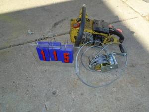 lot 115 image: John Deere chain saw power head for parts or repair & winch for repair. As shown.