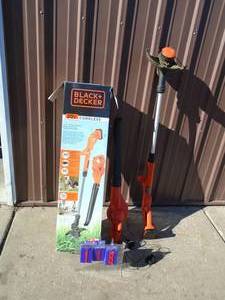 lot 118 image: Black & Decker 20 volt cordless blower & trimmer set with battery & charger. Tested & works. As shown.