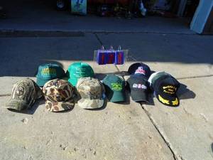 lot 128 image: Assortment of hats. John Deere, Git R Done, etc. As shown.