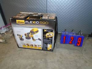 lot 129 image: Wagner flexio 590 paint sprayer. Looks used once. As shown.