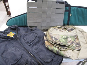 lot 221 image: Gun Case, Stool, Vest