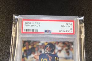 lot 1 image: 2000 Fleer Ultra Tom Brady #234 PSA 8 Rookie Card