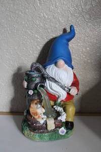 lot 16 image: Solar Powered Lighted Christmas Gnome With Water Pump