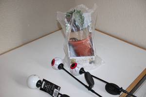 lot 86 image: Three LED Solar Moon Rays--Harry Potter Man Drake-Electronic Interactive Plush--(Mandrake Cries & Shakes When Removed From Flower Pot