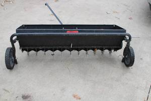 lot 131 image: Tow Behind Plug Lawn Aerator