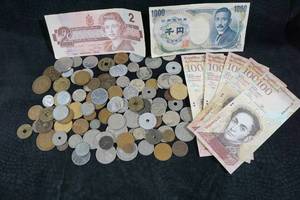 Assorted International Coins and Currency - Canada, Venezuela, UK, Jamaica