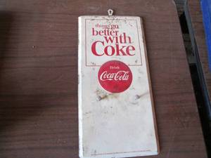 lot 139 image: Metal Coke sign with pegs 7.516...
