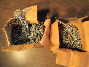 lot 165 image: 2 boxes of small chains...
