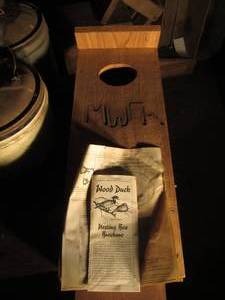 lot 180 image: Cedar wood duck house plus brochure...