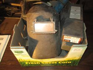 lot 195 image: Box with welding masks, gloves and ...