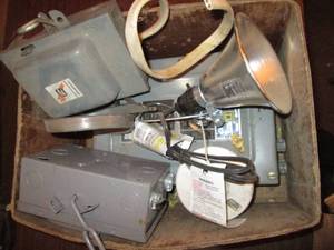 lot 202 image: Box with breaker box, 2 power boxes...