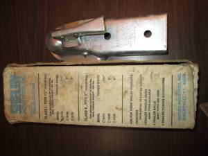 lot 203 image: 2 and 1 78 trailer couplers, 1 n...