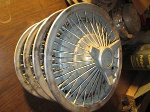 lot 207 image: 1966 Impala Super sport Hubcaps...
