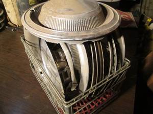 lot 208 image: Crate with misc hubcaps and wheel r...
