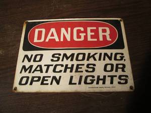 lot 211 image: Danger no smoking, matches, or open...