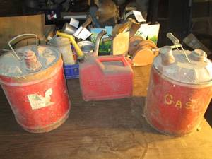 lot 234 image: 2 vintage gas cans and a 2.5 gal pl...