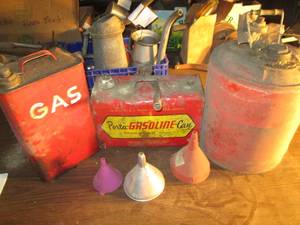 lot 235 image: 3 vintage gas cans and funnels...
