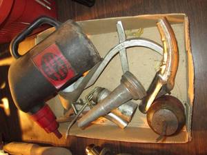 lot 237 image: Vintage oil cans, funnels and spout...
