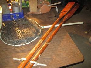 lot 245 image: 2 oars 78 long and fishing net...