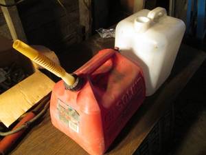 lot 314 image: 5 gallon gas can and clear plastic ...