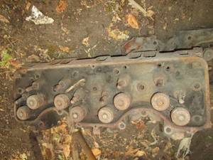 lot 328 image: 2 cylinder heads, not sure what the...