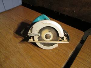 lot 360 image: Makita electric circular saw...
