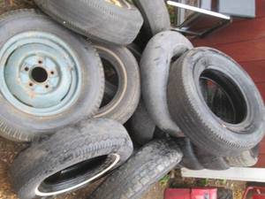 lot 277 image: Pile of used tires, 5 14 rims 4 ar...