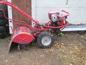 lot 8 image: Troy-Bilt PTO Horse 7HP tiller w o...