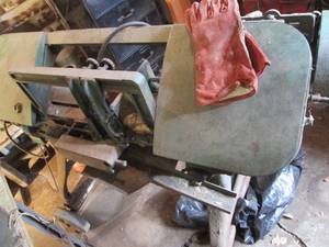 lot 11 image: Large horizontal band saw on wheels...