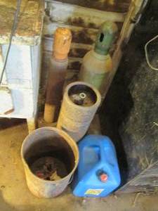lot 15 image: 3 presumably empty tanks, 5 gal ker...