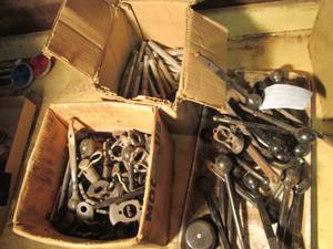 lot 62 image: Lots of valve knobs, long bolts and...
