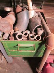 lot 68 image: Large metal bin full of pipe and pi...