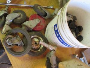 lot 82 image: Pail full of various wheels...