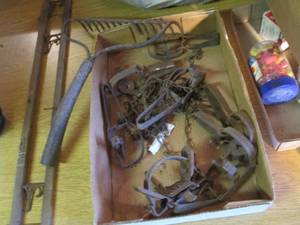 lot 85 image: Several small game traps, metal rak...