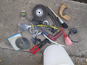 lot 102 image: Pail with misc tools including hand...