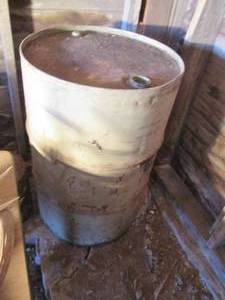 lot 108 image: 50 gallon metal barrel...