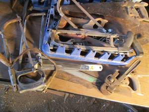 lot 132 image: Crate of many different hand saws a...