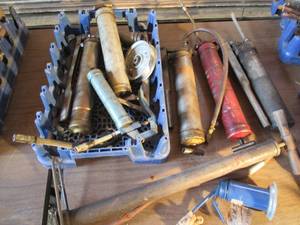 lot 136 image: Crate full of grease guns...