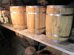 lot 558 image: 3 wood barrels 17 tall and 12 rou...